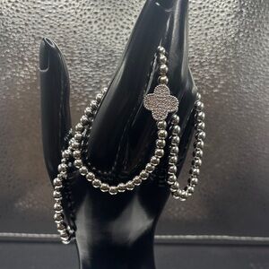 Elegant Silver Beaded Bracelet. Three Stretchy Bracelets .